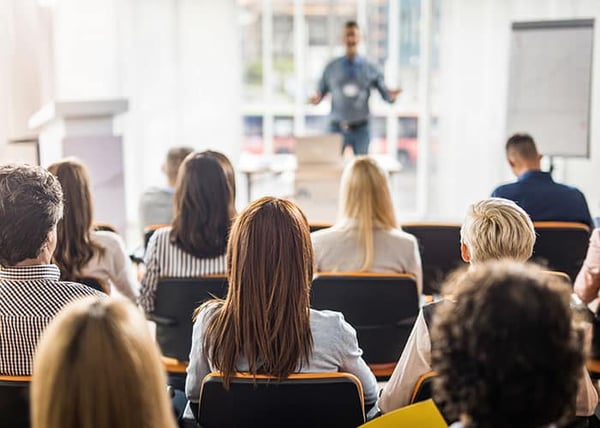 franchise owners learning about franchise fees