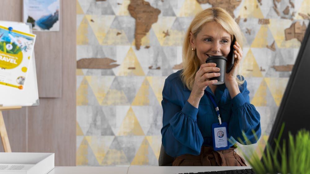 medium-shot-woman-working-office-travel-agency